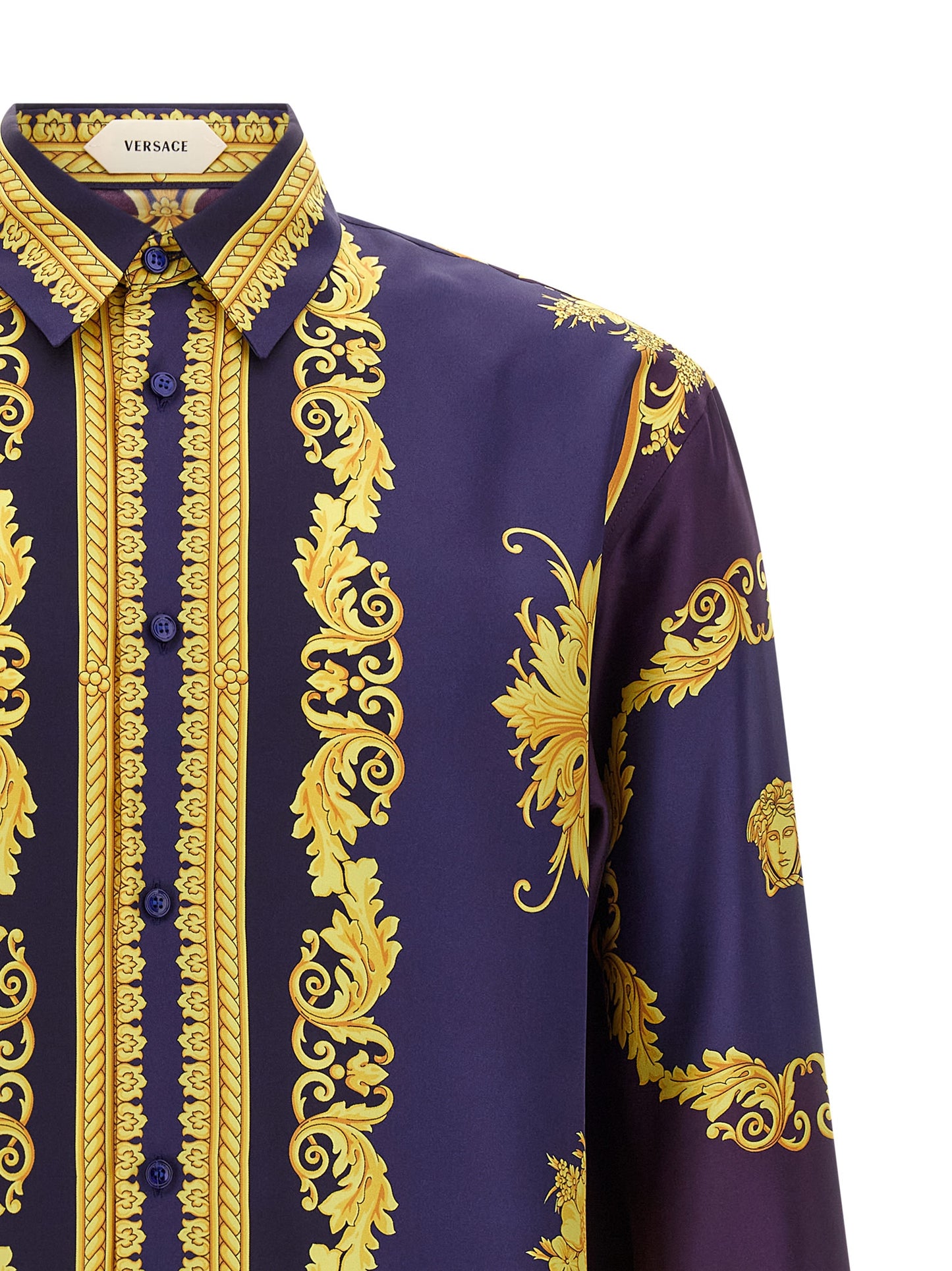 Shirt by Versace for men in silk twill gold, multicolor, purple & print showcases a sharp silhouette, elegantly detailed with a sharp and sharp .