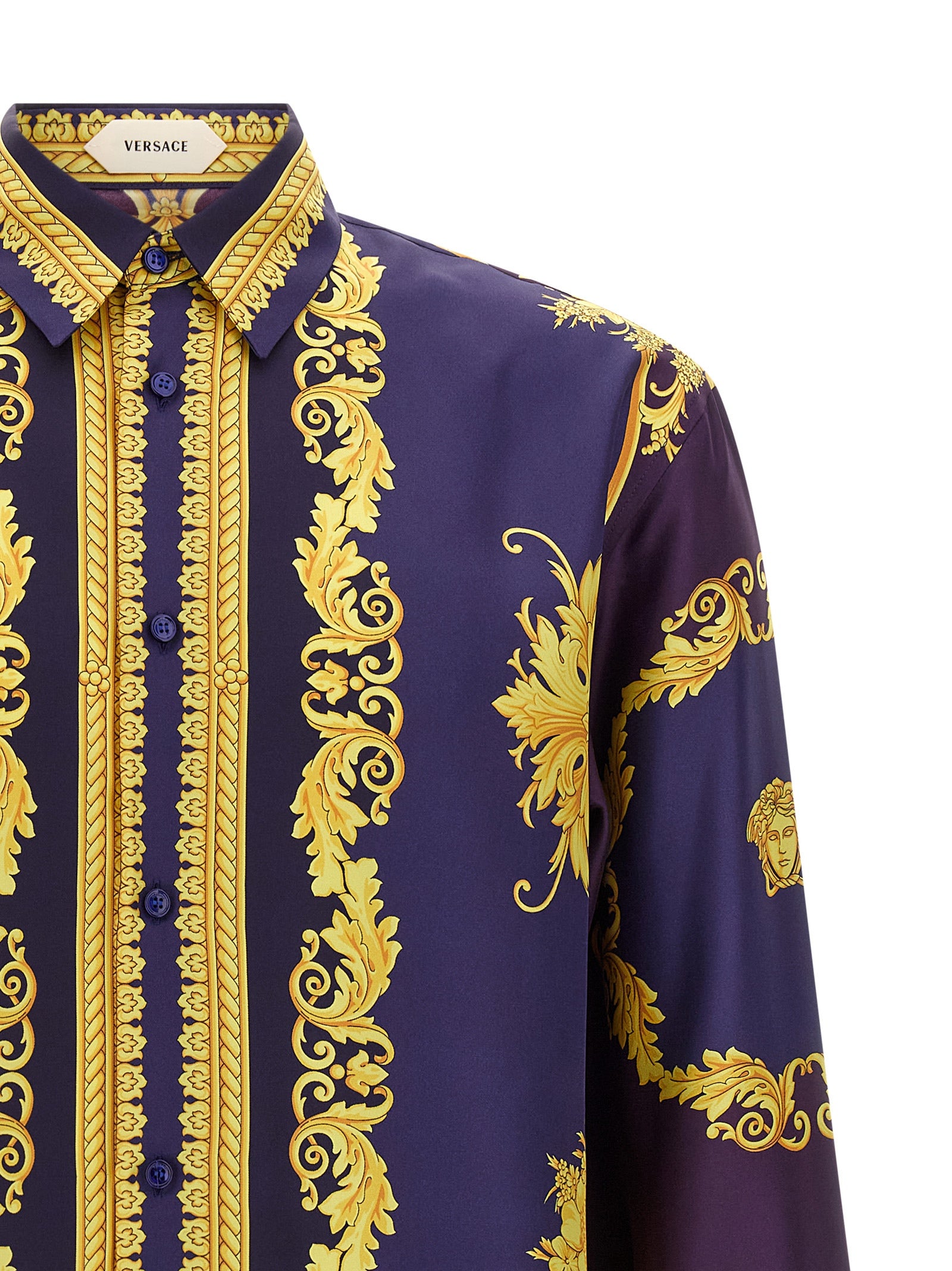 Shirt by Versace for men in silk twill gold, multicolor, purple & print showcases a sharp silhouette, elegantly detailed with a sharp and sharp .