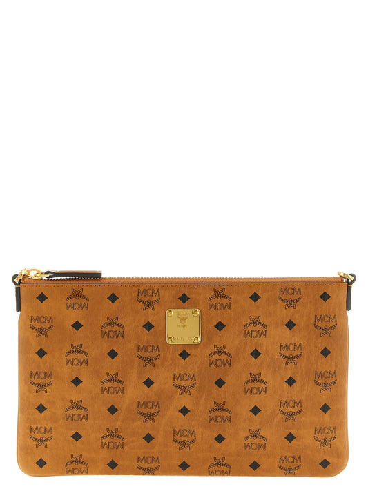 Mini Clutch Handbag by MCM for women in polyester polyethylene polyurethane leather brown, gold & monogram showcases a sculptural silhouette, featuring a secure zipper, ample , and versatile shoulder-strap & adjustable-strap for a sculptural aesthetic.