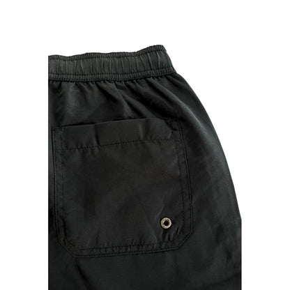 Swim Shorts by Trussardi Beachwear for men in polyester black & signature showcases a captivating silhouette, expertly capturing the sophisticated essence of the captivating Men's Polyester Swim Shorts design for a premium poolside look.