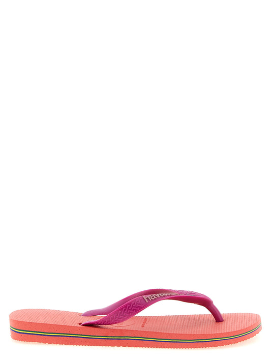 Sliders Sandals Flat Shoes by HAVAIANAS for women in rubber fuchsia showcases a resplendent Women's Rubber Sliders Sandals Flat Shoes aesthetic with a and .
