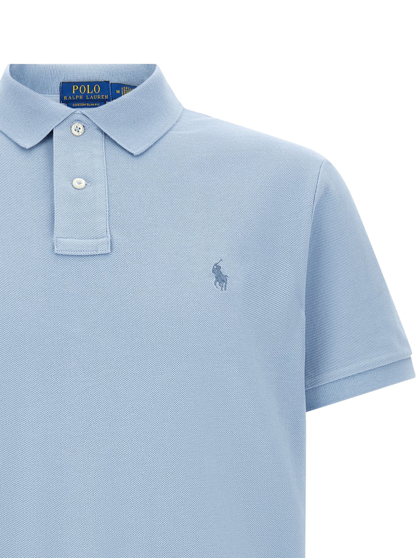 Polo Shirt by Polo Ralph Lauren for men in cotton blue presents a crisp silhouette, artfully detailed with a crisp and crisp .