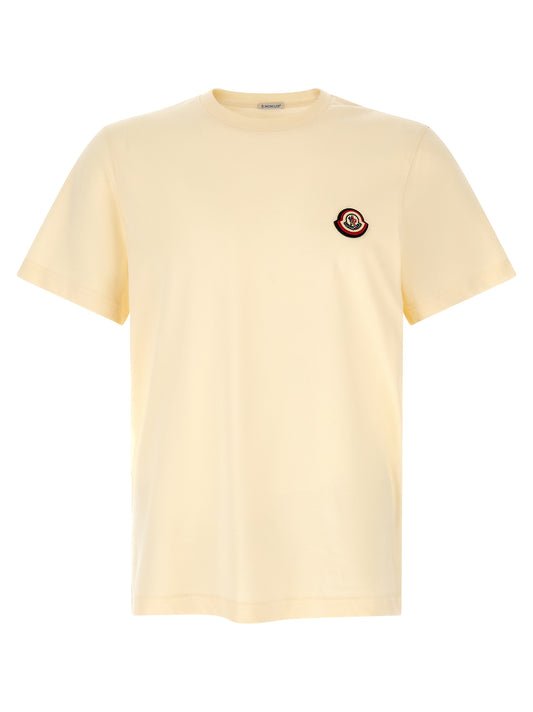 Sweater by Moncler for men in cotton felt ivory, white & signature showcases a sumptuous silhouette, artfully finished with a sumptuous crew neckline and short-sleeve for a sophisticated, sumptuous look.