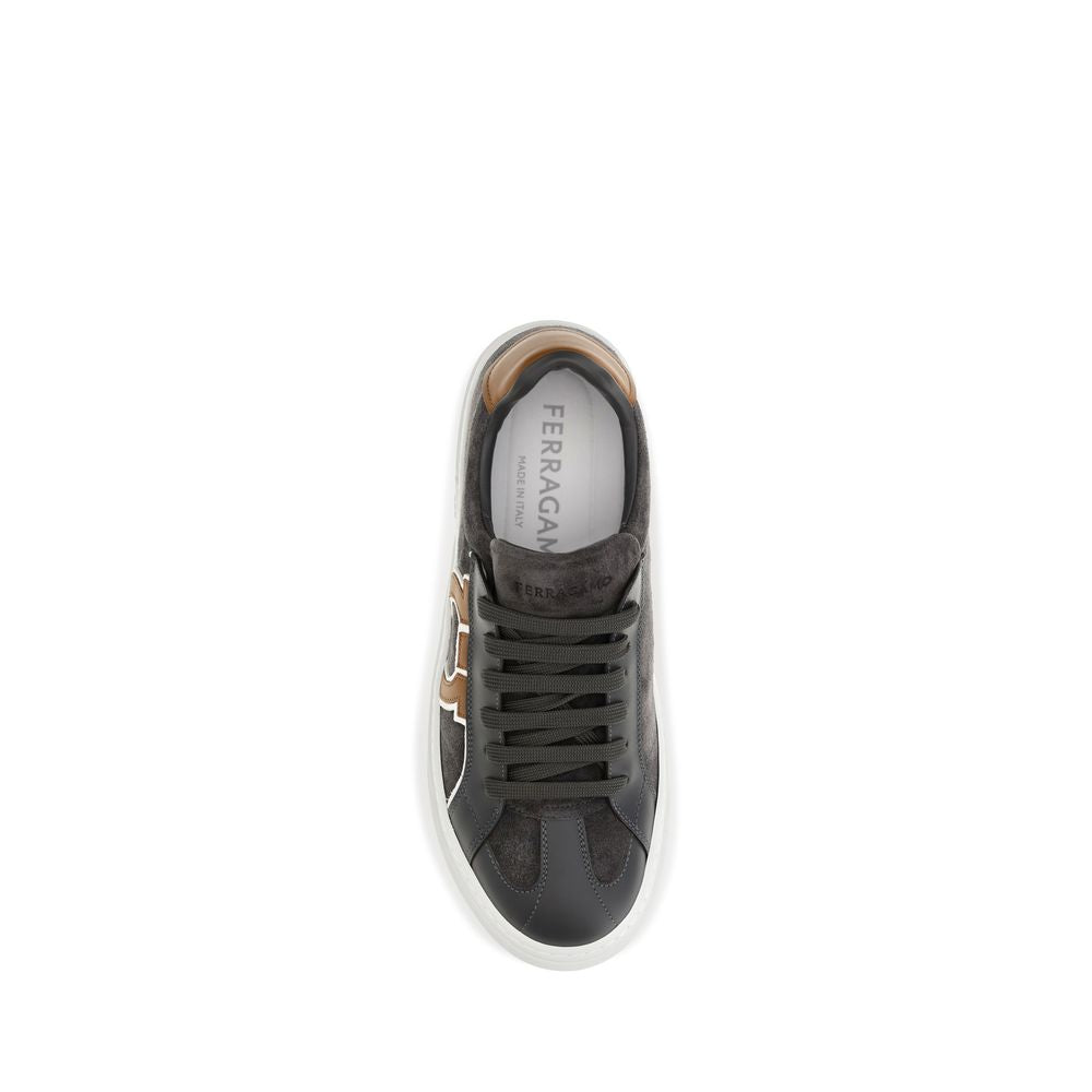 Sneakers by Ferragamo for men in suede calf leather gray & patterned presents a impeccable silhouette as Gancini Men's Low Top Suede Calf Leather Sneakers, expertly defined by a impeccable low-top style for a impeccable, high-fashion look.