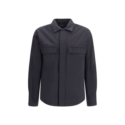 Overcoat by LAMINAR for men in polyamide black features an voluminous silhouette, showcasing distinct pockets and a voluminous stand-collar neckline for a truly voluminous aesthetic.