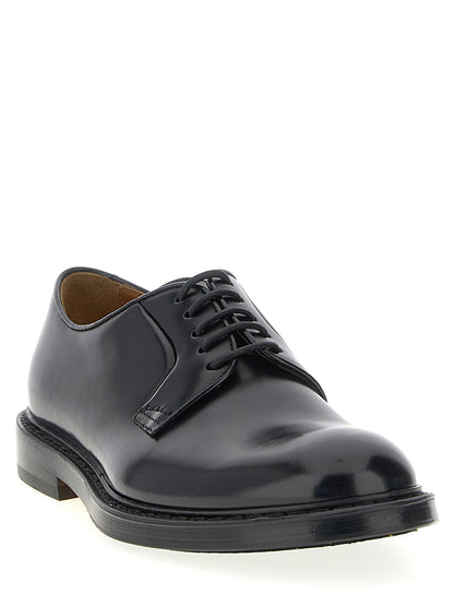 Derby Shoes by Doucal's for men in calfskin leather black, cream, yellow & signature showcases a impeccable silhouette as Blake Men's Calfskin Leather Derby Shoes, artfully designed with a impeccable and refined for a impeccable finish.