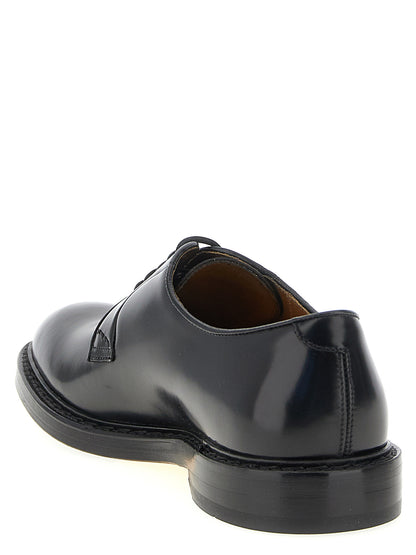 This Derby Shoes by Doucal's for men in calfskin leather black, cream, yellow & signature features an exquisite silhouette from the Blake Men's Calfskin Leather Derby Shoes collection, defined by a sophisticated and elegant .