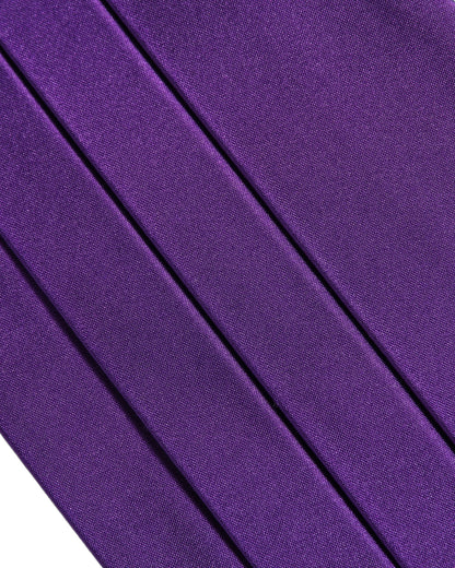 Cummerbund by Dolce & Gabbana for men in silk violet showcases a contemporary silhouette, artfully capturing the essence of the contemporary Silk Cummerbund design for a sophisticated look.