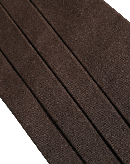 Cummerbund by Dolce & Gabbana for men in silk brown features a resplendent silhouette, artfully capturing the essence of the resplendent Silk Cummerbund design for a sophisticated, premium look.