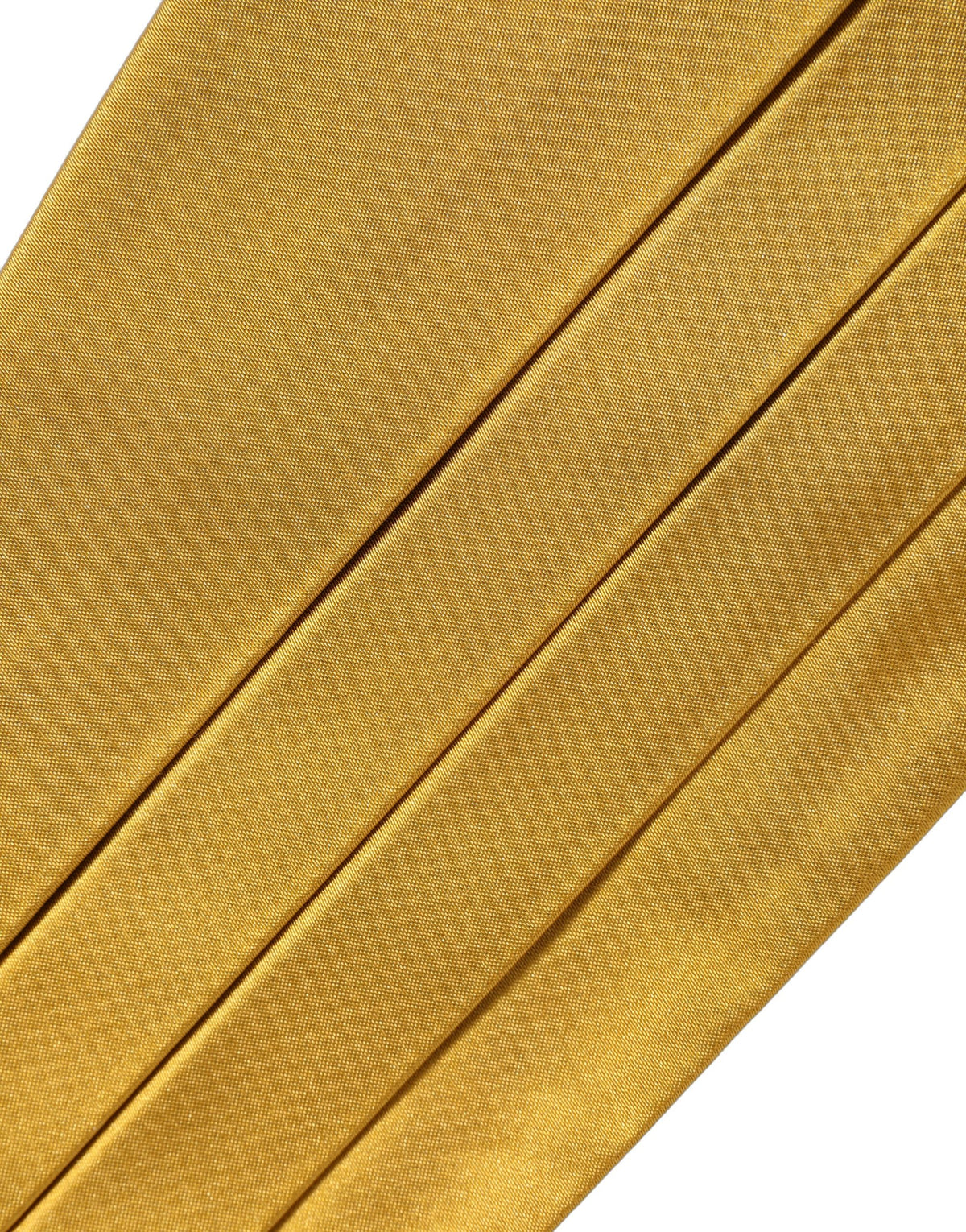 Cummerbund by Dolce & Gabbana for men in silk gold features a timeless silhouette, showcasing the timeless design and refined style of the Silk Cummerbund.