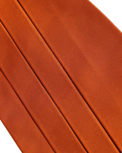 Cummerbund by Dolce & Gabbana for men in silk orange features a stylish silhouette, artfully showcasing the refined aesthetics and stylish detailing of the Silk Cummerbund.