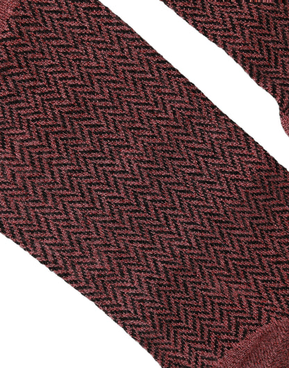 Socks by Dolce & Gabbana for men in polyester cotton nylon & calf leather burgundy & herringbone features an stylish silhouette, showcasing the stylish design of this Men's Polyester Cotton Nylon & Calf Leather Socks with a stylish finish.