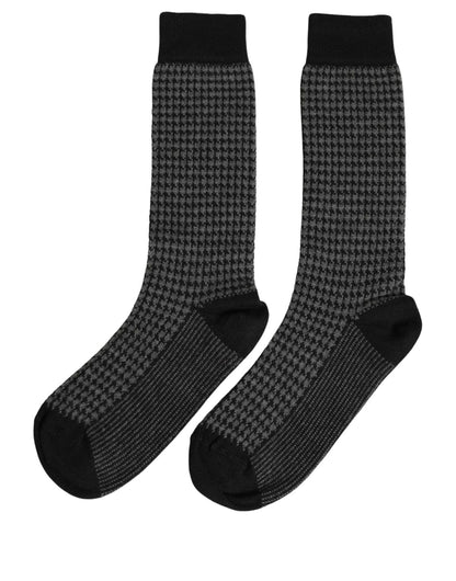 Socks by Dolce & Gabbana for men in calf leather nylon acrylic wool black, gray, patterned, houndstooth & signature features an utilitarian chic finish from the Men's Calf Leather Nylon Acrylic Wool Socks collection, offering an utilitarian chic fit that ensures sophisticated comfort.