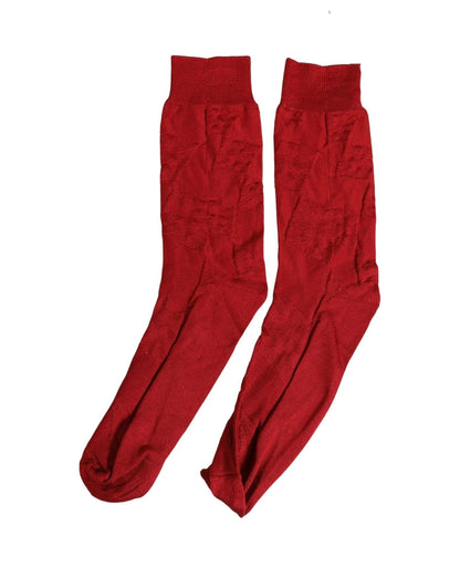 Socks by Dolce & Gabbana for men in calf leather & silk red presents a perennial silhouette, artfully capturing the refined essence of the perennial Men's Calf Leather & Silk Socks design with a perennial finish.