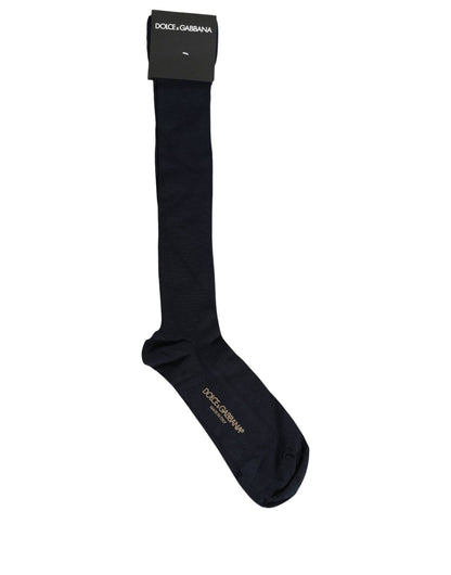 These Socks by Dolce & Gabbana for men in calf leather nylon & viscose dark-blue present a utilitarian silhouette from the Men's Calf Leather Nylon & Viscose Socks collection, offering a utilitarian fit and refined aesthetic.