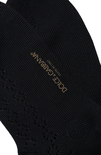 Socks by Dolce & Gabbana for men in calf leather & cotton dark-blue features a snug silhouette, artfully capturing the essence of the snug Men's Calf Leather & Cotton Socks design for a sophisticated look.