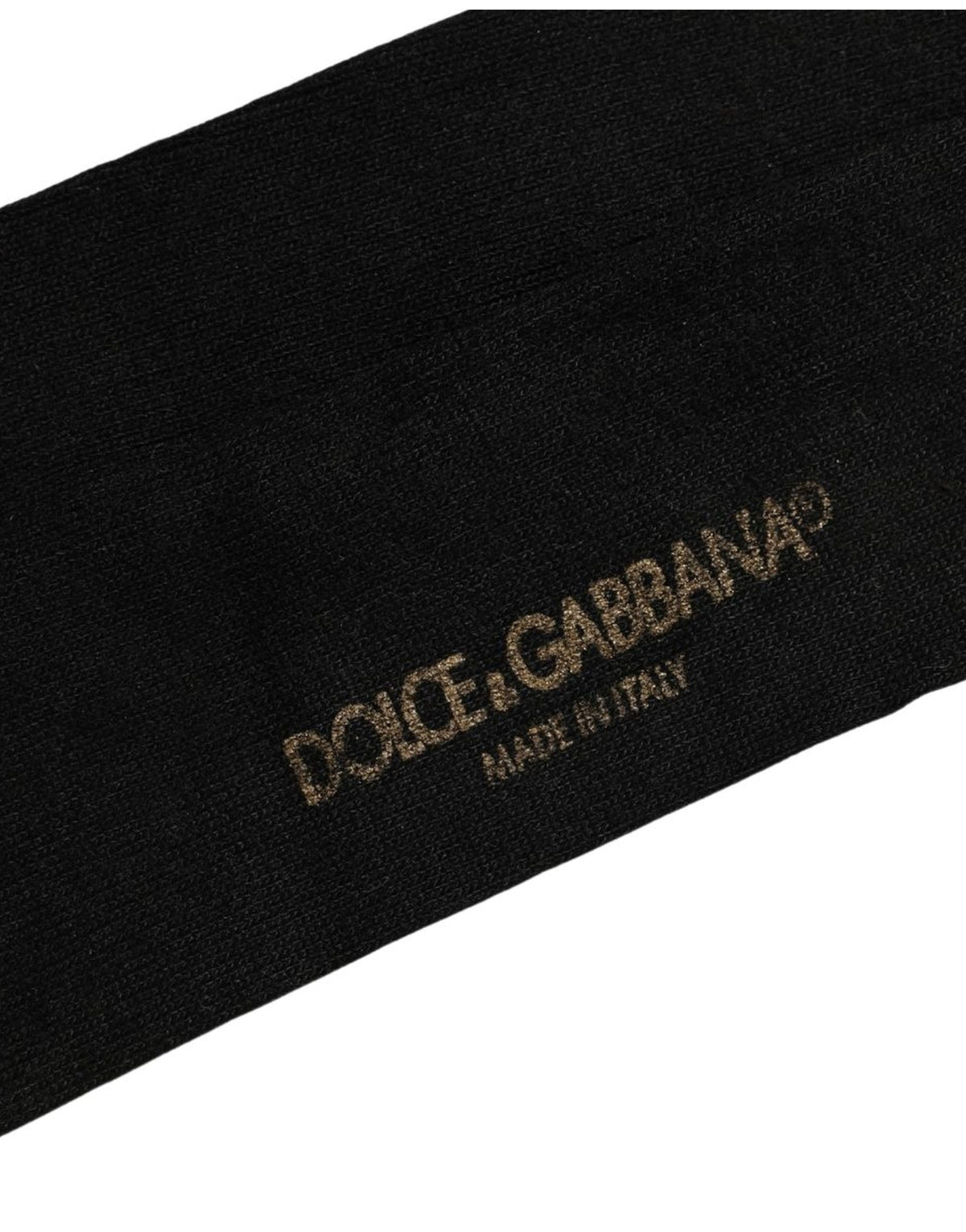 Socks by Dolce & Gabbana for men in nylon & viscose black features a snug silhouette, artfully capturing the essence of the snug Men's Nylon & Viscose Socks design for a sophisticated look.
