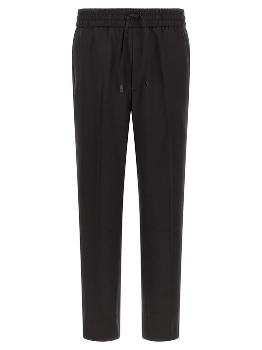 Trousers by Brioni for men in virgin wool brown features a tailored silhouette with a tailored straight, defined by its long and a sophisticated .