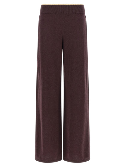 Trousers by PINKO for women in cashmere purple features an sartorial silhouette, showcasing a precise relaxed-fit, wide & slim and long with a sartorial for a refined look.