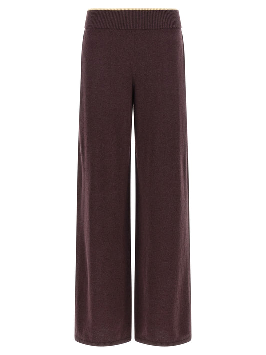 Trousers by PINKO for women in cashmere purple features an sartorial silhouette, showcasing a precise relaxed-fit, wide & slim and long with a sartorial for a refined look.