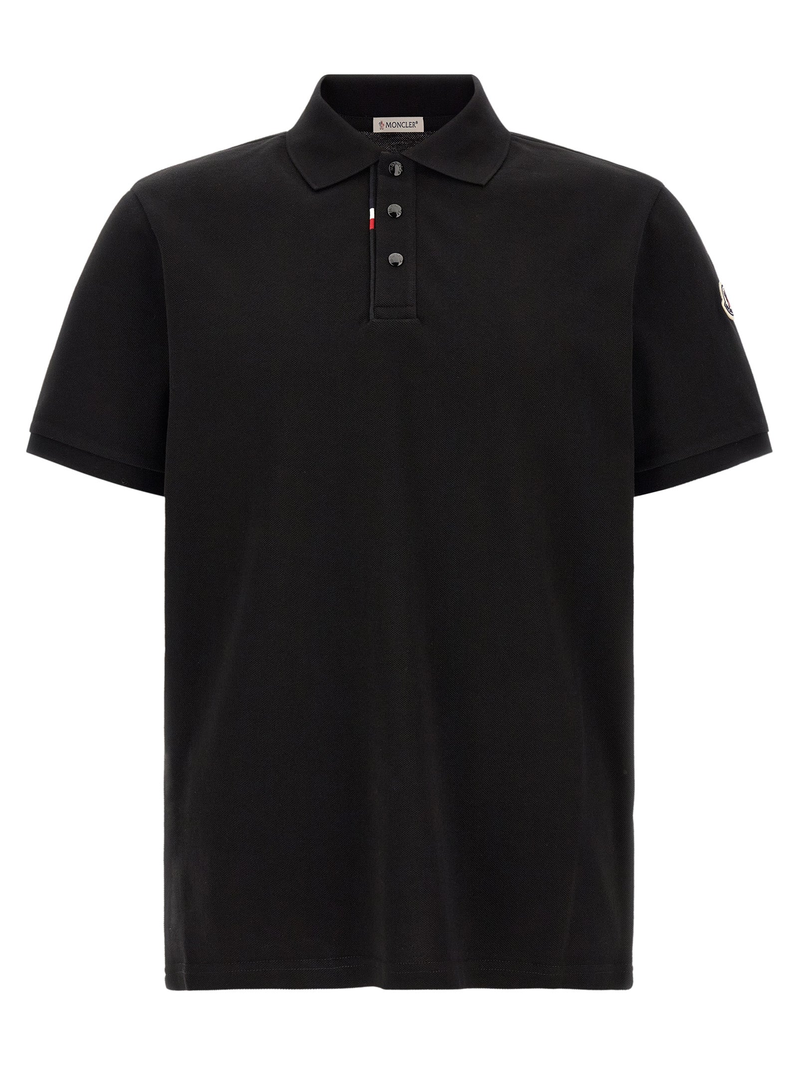 Polo Shirt by Moncler for men in cotton felt black presents a distinguished silhouette, showcasing a sophisticated and distinguished short-sleeve for a truly distinguished finish.