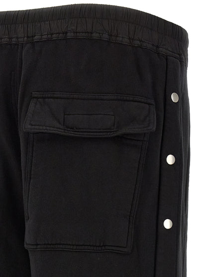 Trousers by DRKSHDW for men in horse leather & cotton black & silver presents a perennial silhouette, meticulously tailored with a flared & wide cut, long finish, and an elegant .
