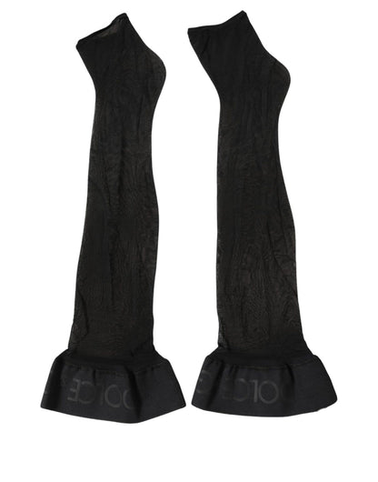 Socks by Dolce & Gabbana for women in calf leather & nylon black features an utilitarian chic finish from the Women's Calf Leather & Nylon Socks collection, offering an utilitarian chic fit that ensures sophisticated comfort.