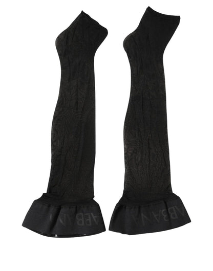 Socks by Dolce & Gabbana for women in calf leather & nylon black features a snug silhouette, artfully capturing the essence of the snug Women's Calf Leather & Nylon Socks design for a sophisticated look.