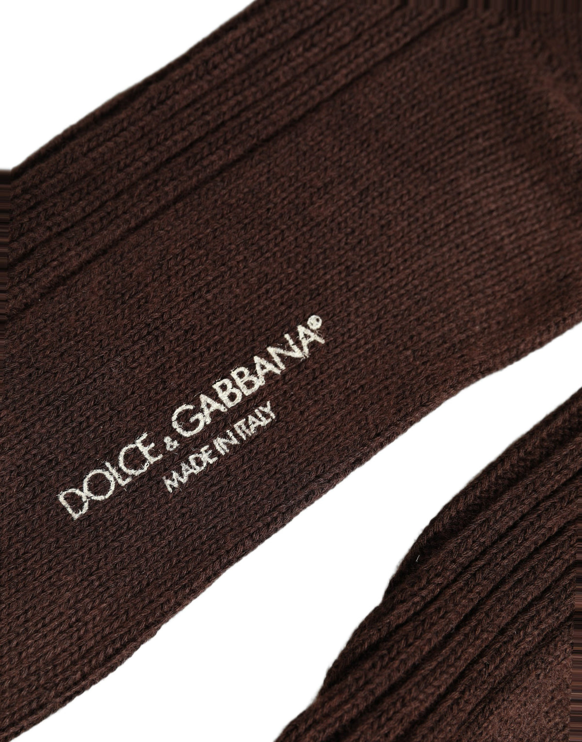 Socks by Dolce & Gabbana for women in calf leather nylon acrylic wool brown features a contemporary knit construction, showcasing the sophisticated design of this Women's Calf Leather Nylon Acrylic Wool Socks with its contemporary finish.