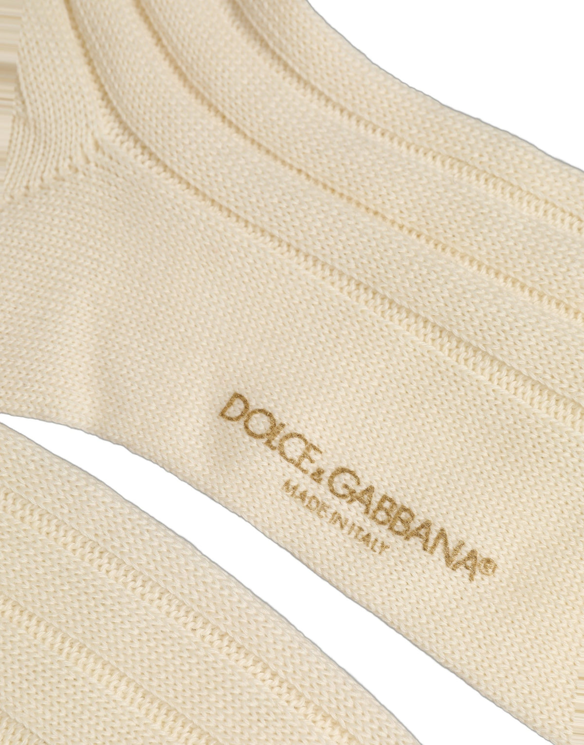 Socks by Dolce & Gabbana for women in nylon acrylic wool beige presents a perennial silhouette, artfully capturing the refined essence of the perennial Women's Nylon Acrylic Wool Socks design with a perennial finish.
