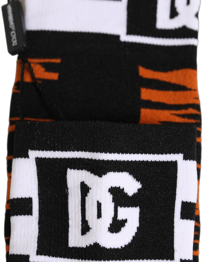 Socks by Dolce & Gabbana for women in stretch cotton & nylon black, orange, patterned & striped features a nuanced silhouette, showcasing the nuanced Women's Stretch Cotton & Nylon Socks design with a refined, premium finish.