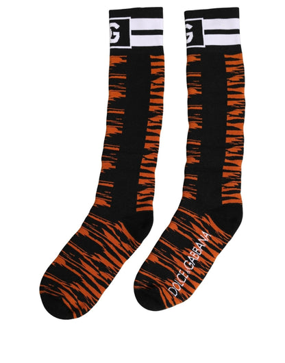 Socks by Dolce & Gabbana for women in stretch cotton & nylon black, orange, patterned & striped features an utilitarian chic finish from the Women's Stretch Cotton & Nylon Socks collection, offering an utilitarian chic fit that ensures sophisticated comfort.