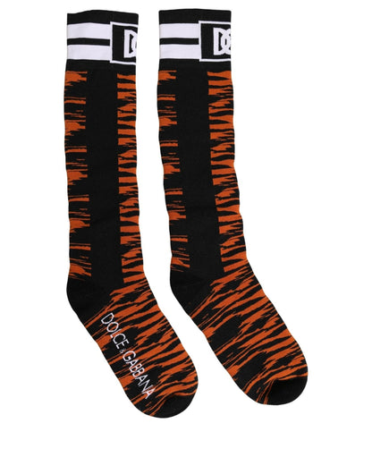 Socks by Dolce & Gabbana for women in stretch cotton & nylon black, orange, patterned & striped features a snug silhouette, artfully capturing the essence of the snug Women's Stretch Cotton & Nylon Socks design for a sophisticated look.
