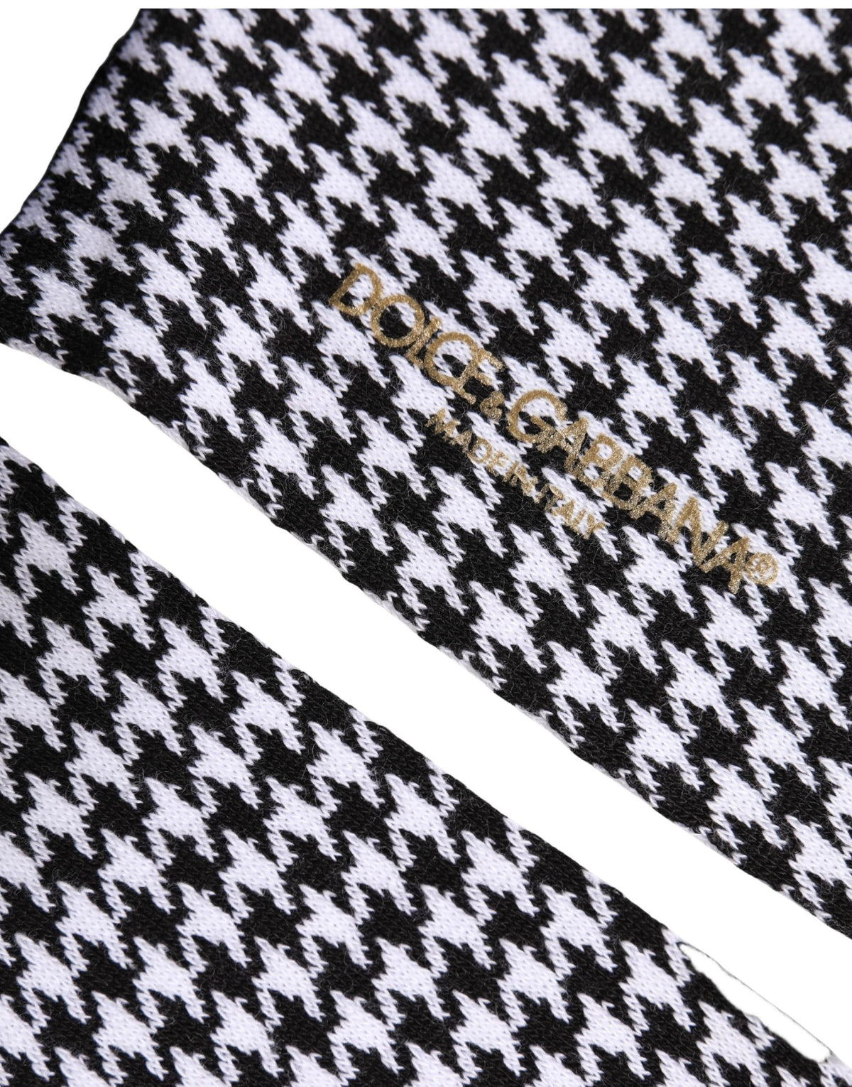 Socks by Dolce & Gabbana for women in nylon cotton & calf leather black, white, patterned & houndstooth features a snug silhouette, artfully capturing the essence of the snug Women's Nylon Cotton & Calf Leather Socks design for a sophisticated look.