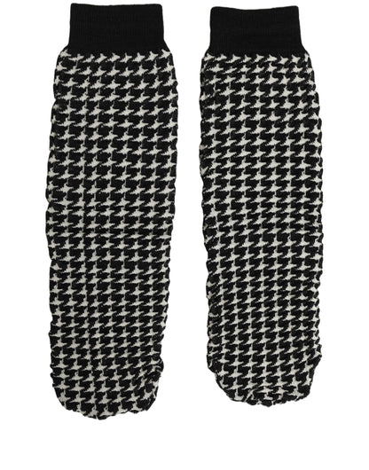 These Socks by Dolce & Gabbana for women in virgin wool & nylon black, white, patterned & houndstooth present a utilitarian silhouette from the Women's Virgin Wool & Nylon Socks collection, offering a utilitarian fit and refined aesthetic.