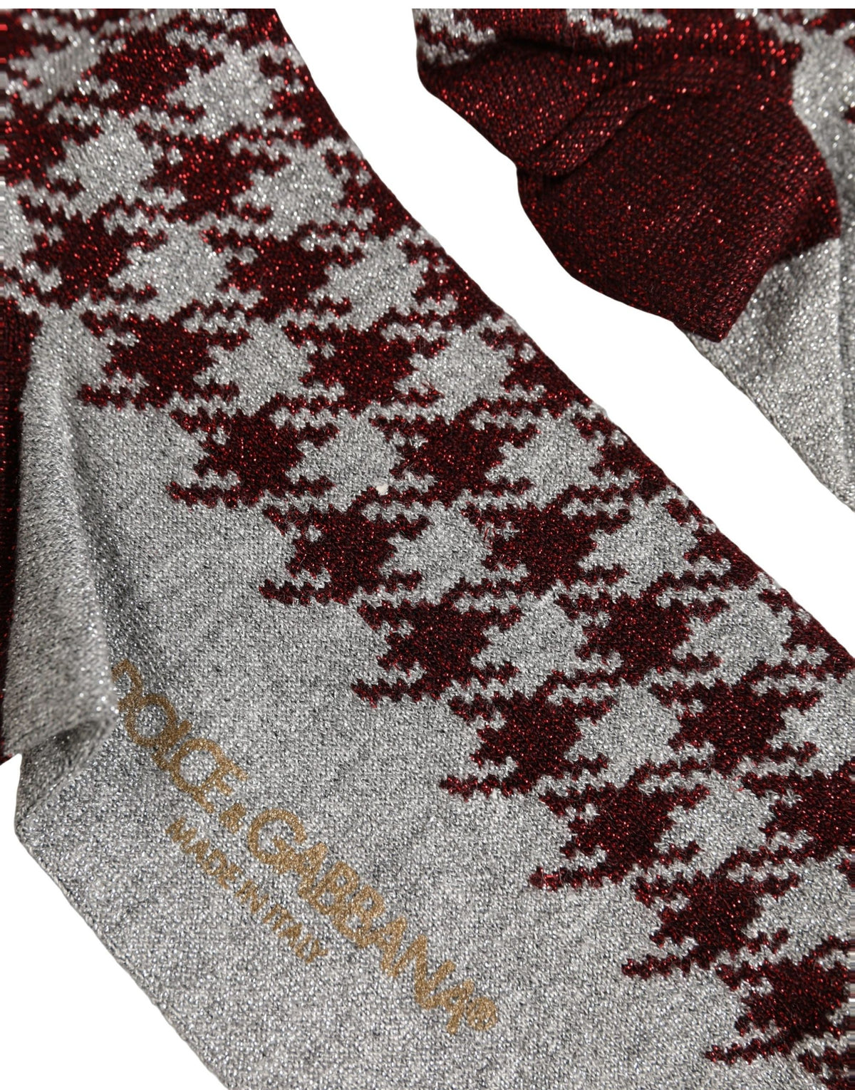 Socks by Dolce & Gabbana for women in nylon polyester viscose & calf leather gray, maroon, patterned & houndstooth features a contemporary knit construction, showcasing the sophisticated design of this Women's Nylon Polyester Viscose & Calf Leather Socks with its contemporary finish.