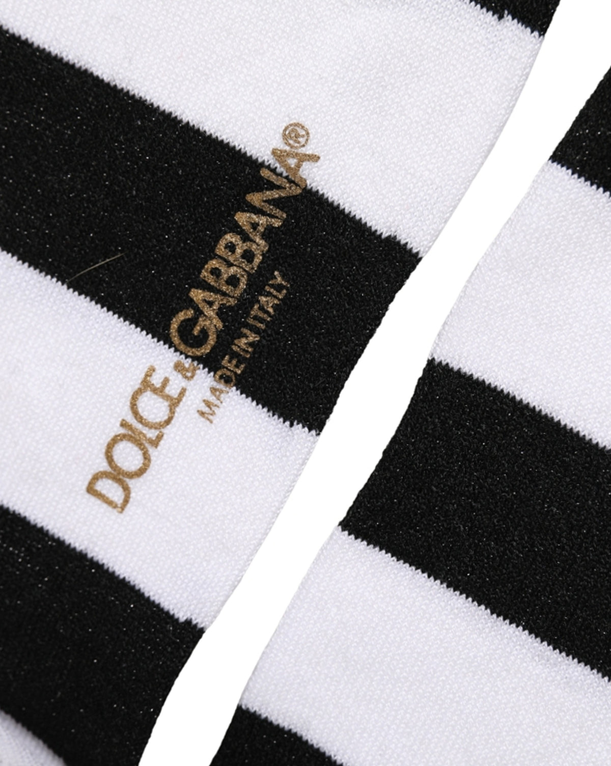 Socks by Dolce & Gabbana for women in nylon polyester viscose & calf leather black, white & striped features an stylish silhouette, showcasing the stylish design of this Women's Nylon Polyester Viscose & Calf Leather Socks with a stylish finish.