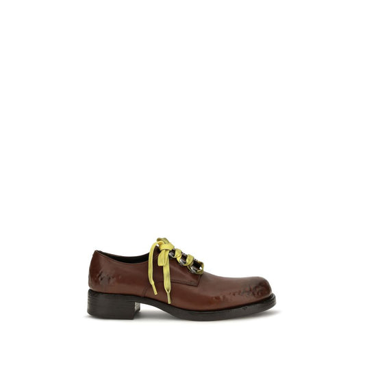 Flat Loafer Slip-On Lace-Up Shoes by Prada for women in bos taurus calf leather brown features an dynamic silhouette from the Women's Bos Taurus Calf Leather Flat Loafer Slip-On Lace-Up Shoes collection, defined by a dynamic and flat for a dynamic look.