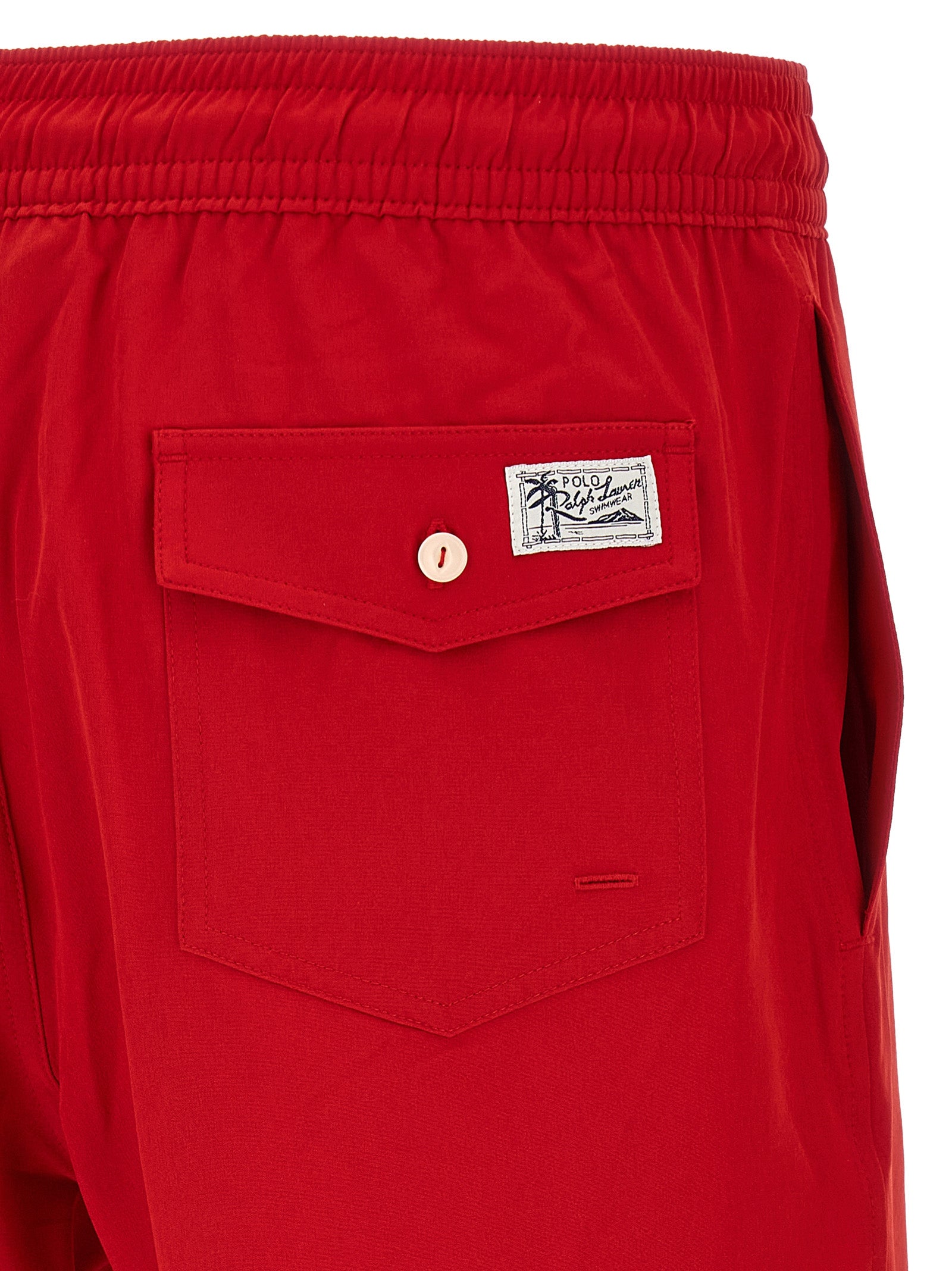 Swim Shorts from Polo Ralph Lauren for men in stretch polyester mesh multicolor, navy, red & white features an sleek silhouette, showcasing the distinct style of the Pony Men's Stretch Polyester Mesh Swim Shorts collection.