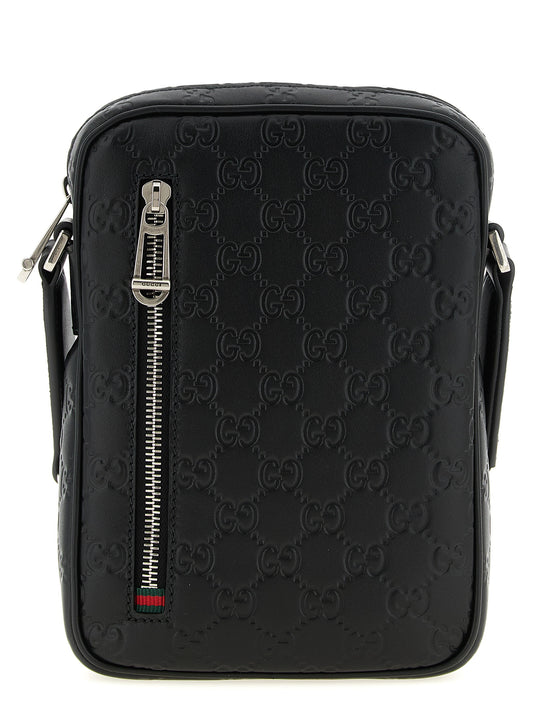 2-in-1 Shoulder & Crossbody Messenger Bag by Gucci for men in bos taurus calfskin leather black & patterned presents a on trend Gg Bos Taurus Calfskin Leather 2-in-1 Shoulder & Crossbody Messenger Bag design, featuring a secure zipper, ample , and on trend crossbody-strap, shoulder-strap & adjustable-strap for a on trend finish.