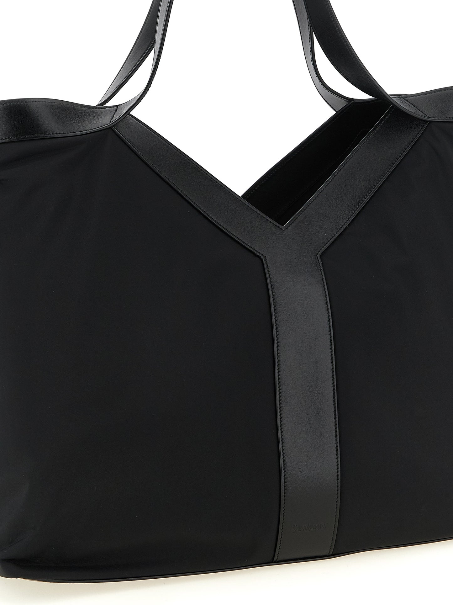 Large Tote Bag by Saint Laurent for men in bos taurus calfskin leather & polyamide black features an metropolitan chic City Bos Taurus Calfskin Leather & Polyamide Large Tote Bag design with a secure , metropolitan chic , and versatile handle for a metropolitan chic look.