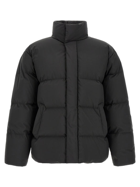 This Puffer Jacket by Saint Laurent for men in polyester black exhibits a edgy silhouette, meticulously detailed with functional pockets & insulated and a edgy high-neck neckline for a edgy finish.