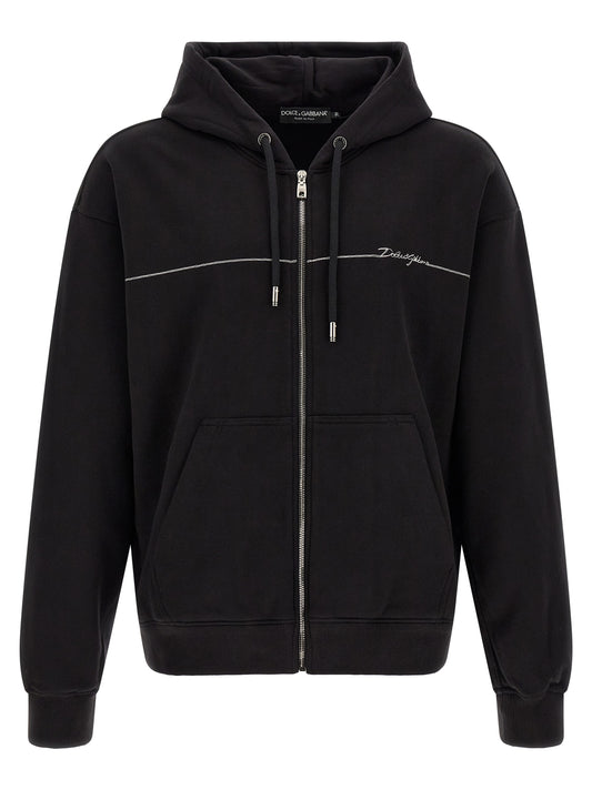 Sweatshirt Hoodie by Dolce & Gabbana for men in cotton satin black & silver showcases a city-ready silhouette, artfully detailed with a signature hooded neckline and for a city-ready finish.