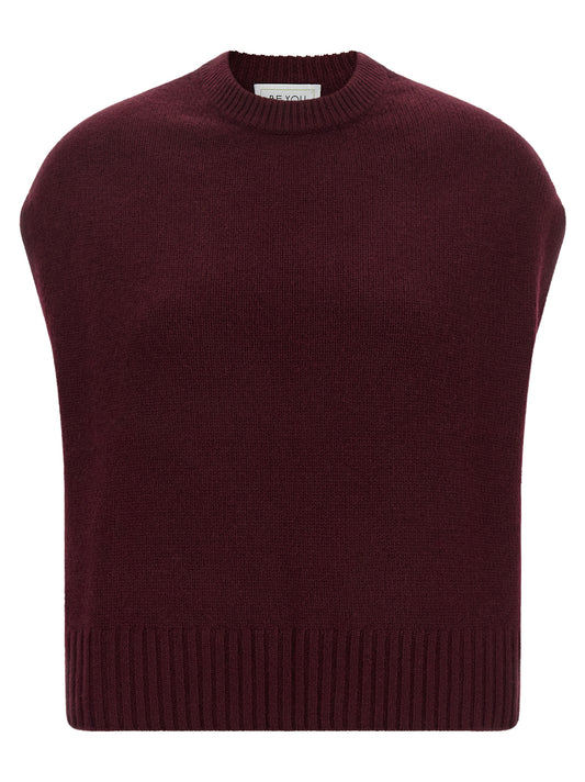 Vest by BE YOU for women in cashmere bordeaux & burgundy showcases a utilitarian silhouette, artfully incorporating and a utilitarian crew neckline for a truly utilitarian finish.