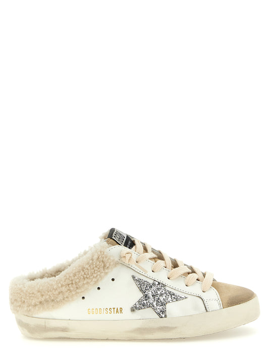 Sneakers by Golden Goose for women in polyester suede leather & cotton beige, gold, silver & white presents a impeccable silhouette as Star Women's Chunky Polyester Suede Leather & Cotton Sneakers, expertly defined by a impeccable chunky style for a impeccable, high-fashion look.