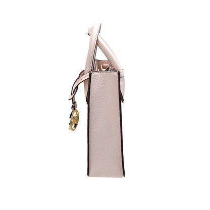 Compact 2-in-1 Shoulder & Crossbody Bag by Michael Kors for women in faux leather & canvas beige, gold, powder-pink & patterned features an effortlessly chic silhouette with a secure magnetic, ample , and versatile crossbody-strap, shoulder-strap, detachable-strap & handle for effortlessly chic everyday luxury.