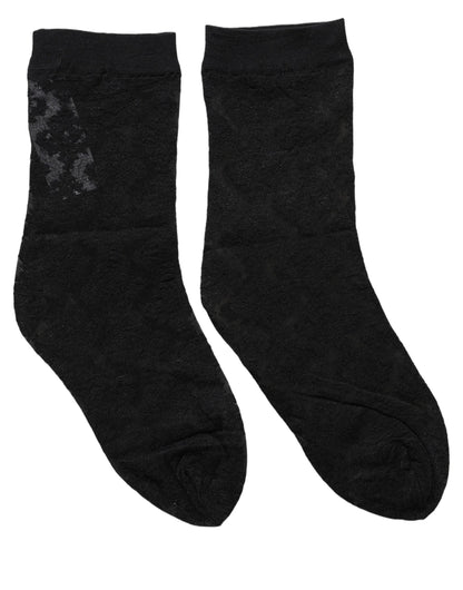 Socks by Dolce & Gabbana for women in stretch nylon mesh & calf leather black, patterned & floral features an utilitarian chic finish from the Women's Stretch Nylon Mesh & Calf Leather Socks collection, offering an utilitarian chic fit that ensures sophisticated comfort.
