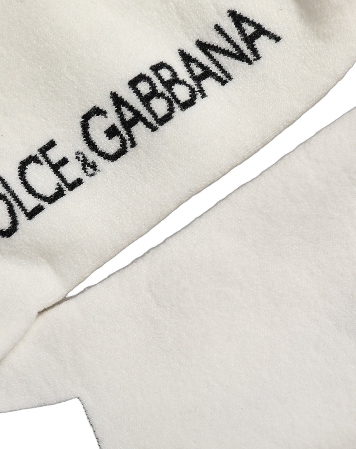 Socks by Dolce & Gabbana for women in nylon cotton black, white & striped features an utilitarian chic finish from the Women's Nylon Cotton Socks collection, offering an utilitarian chic fit that ensures sophisticated comfort.