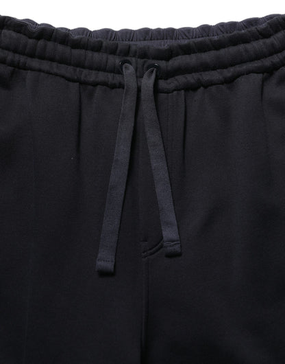 Joggers by Dolce & Gabbana for men in viscose dark-blue features an sartorial relaxed-fit & wide and long with a cut for a sartorial finish.