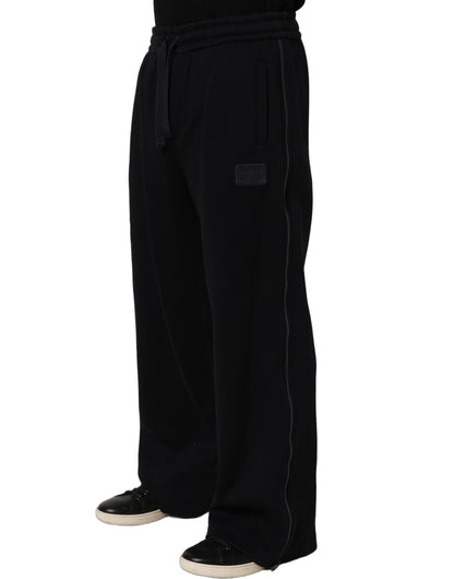 Joggers by Dolce & Gabbana for men in viscose dark-blue features an refined tailoring silhouette, showcasing a premium relaxed-fit & wide with a and long cut for a refined tailoring look.